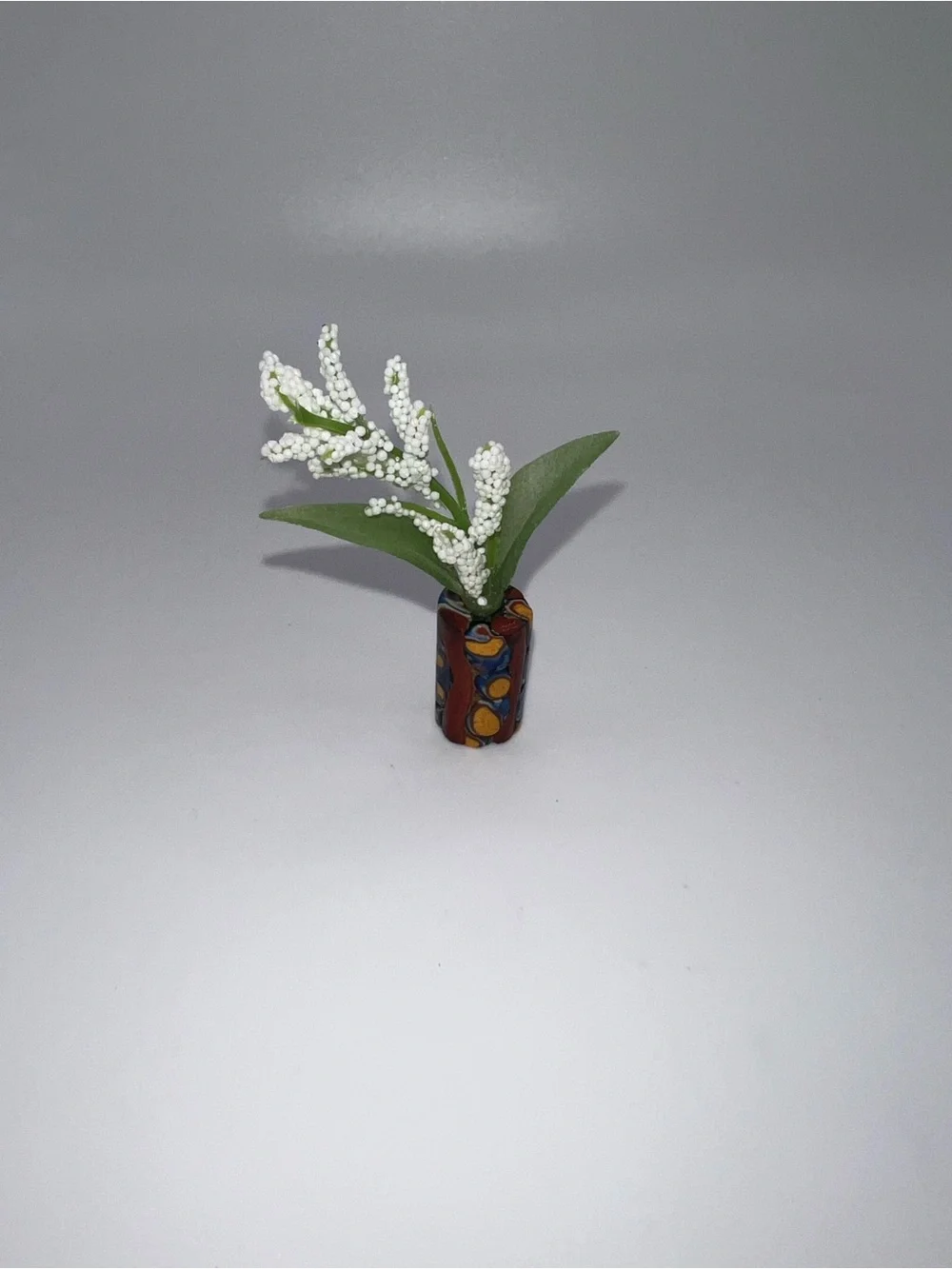 Miniature Decorative Vase with White Floral Spray